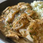 Close-up view of juicy Crockpot Chicken and Gravy.